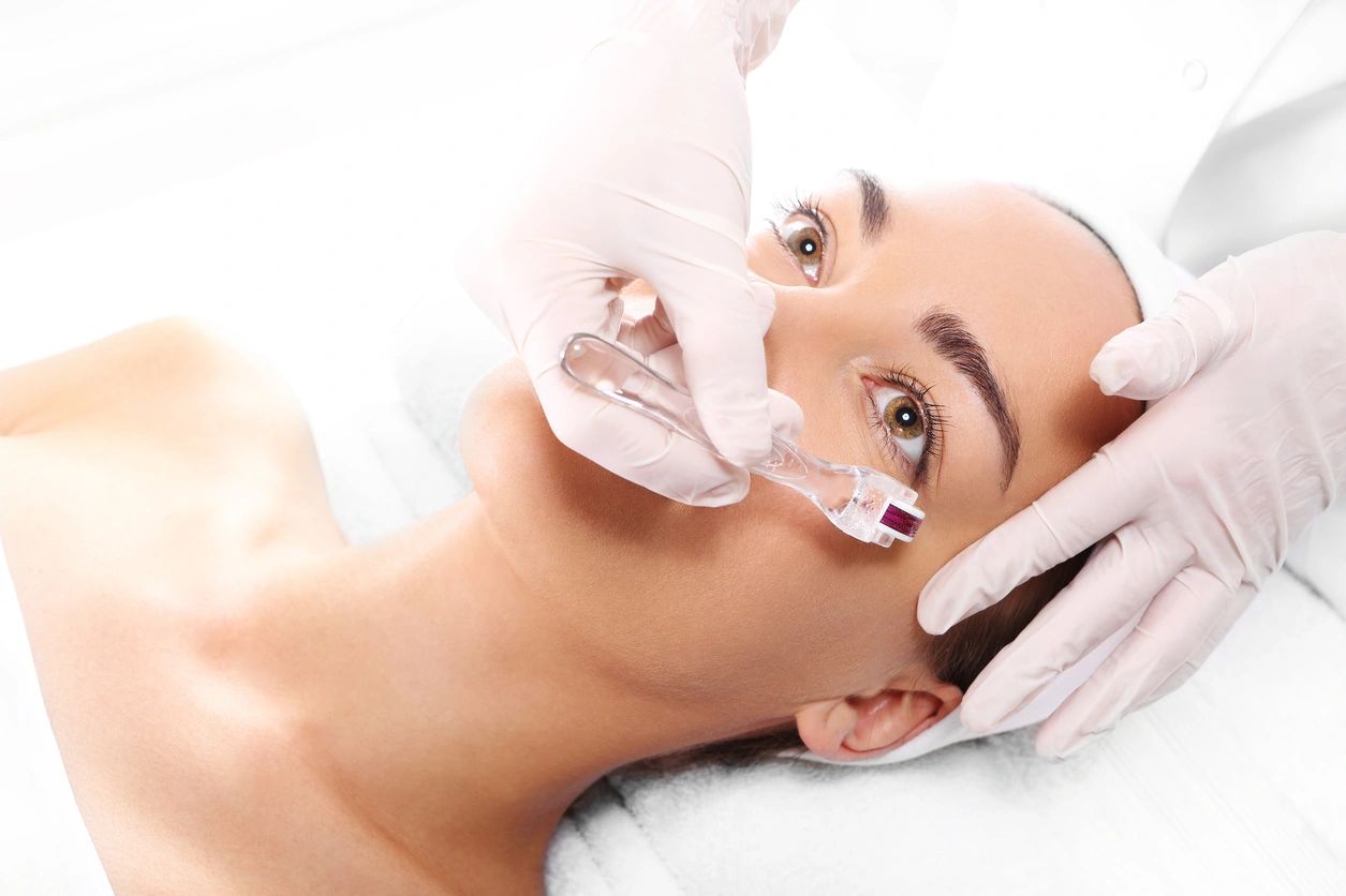 A client receiving a laser facial treatment